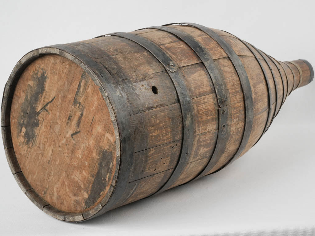 Traditional metal-barreled wine jug