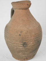 Antique European pottery brown pitcher