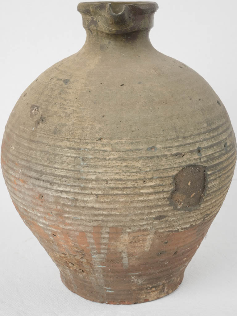Antique large terracotta beaked pottery vessel