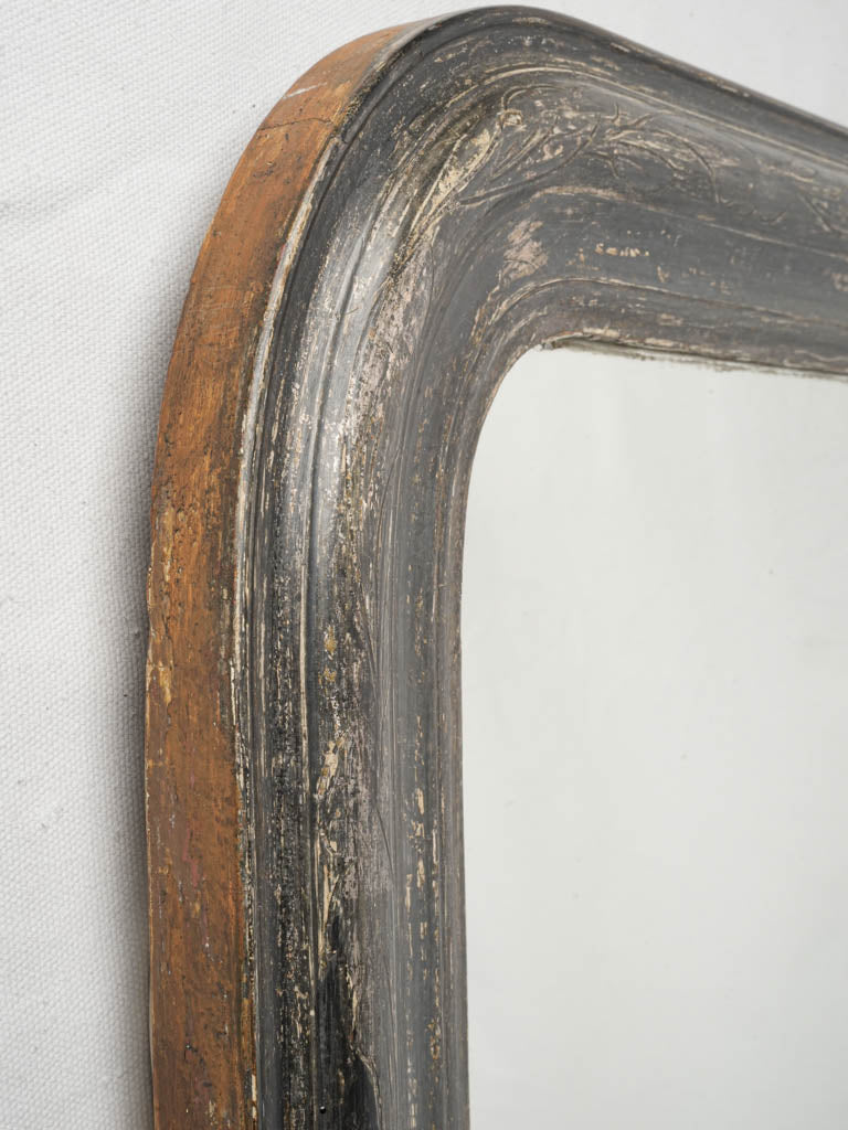 Ornate silver-layered decorative mirror  