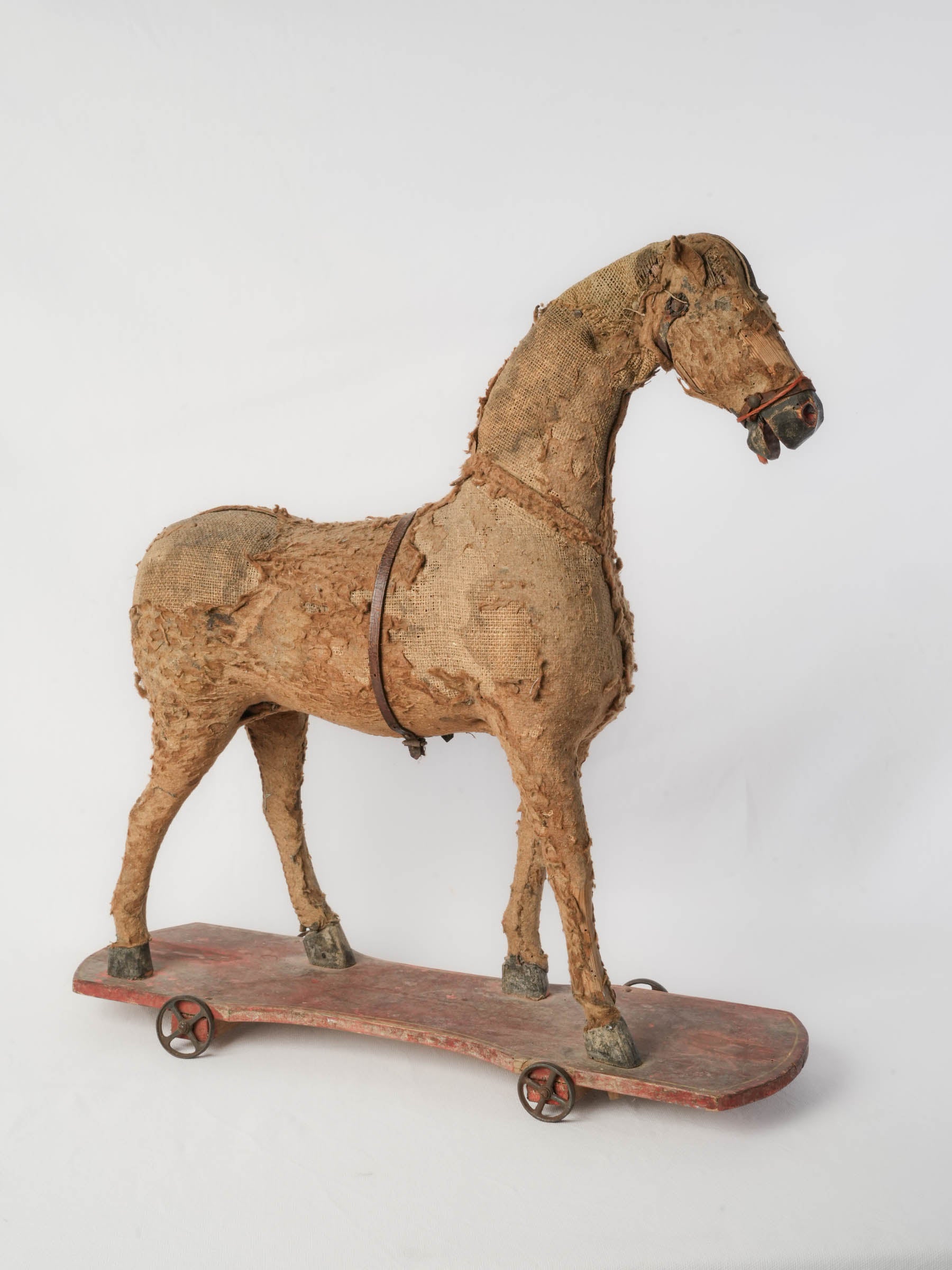 Evocative antique pull toy horse
