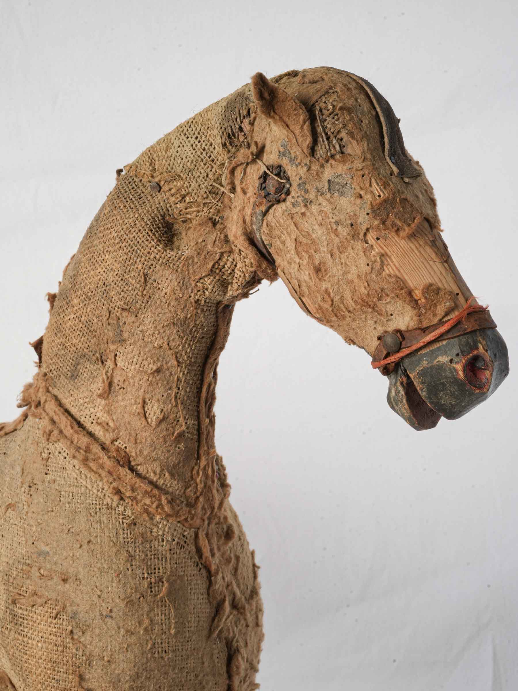 Aged textile-covered nursery sculpture