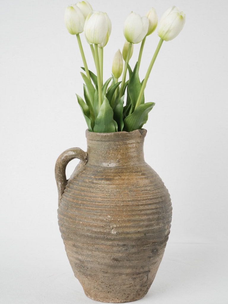 French ceramic pitcher with green glaze