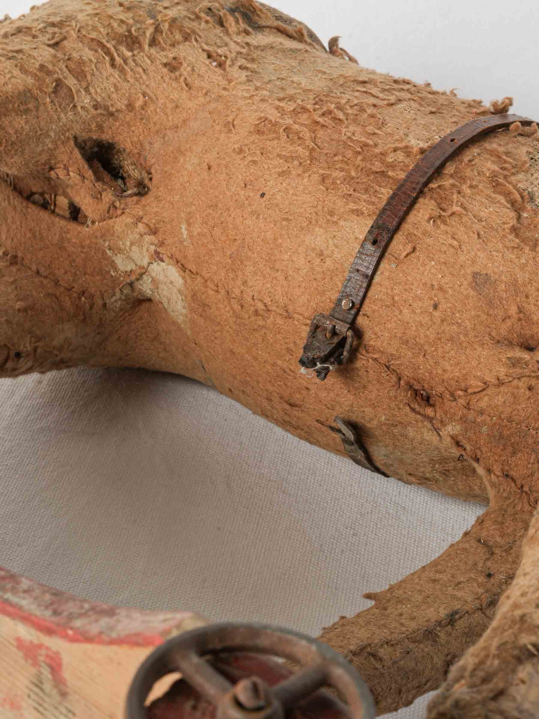 Aged country-style wheeled horse toy