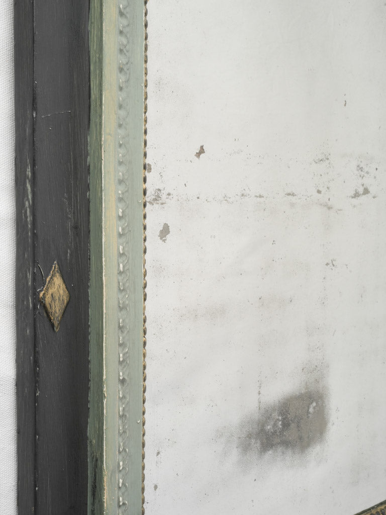 Heart-and-dart motif mirror