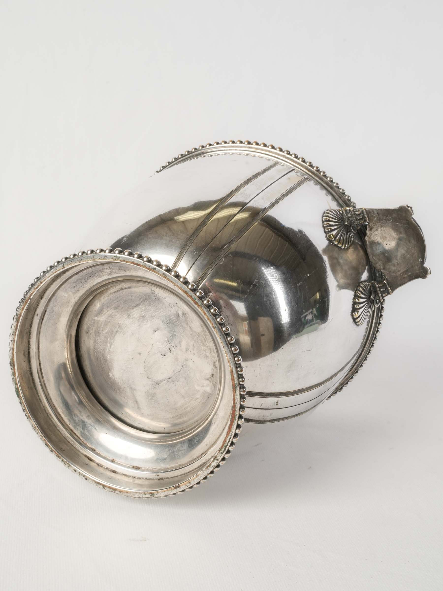 Finely cast shell handled cooler