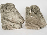 Pair of salvaged carved stone ram heads from a church 14¼"
