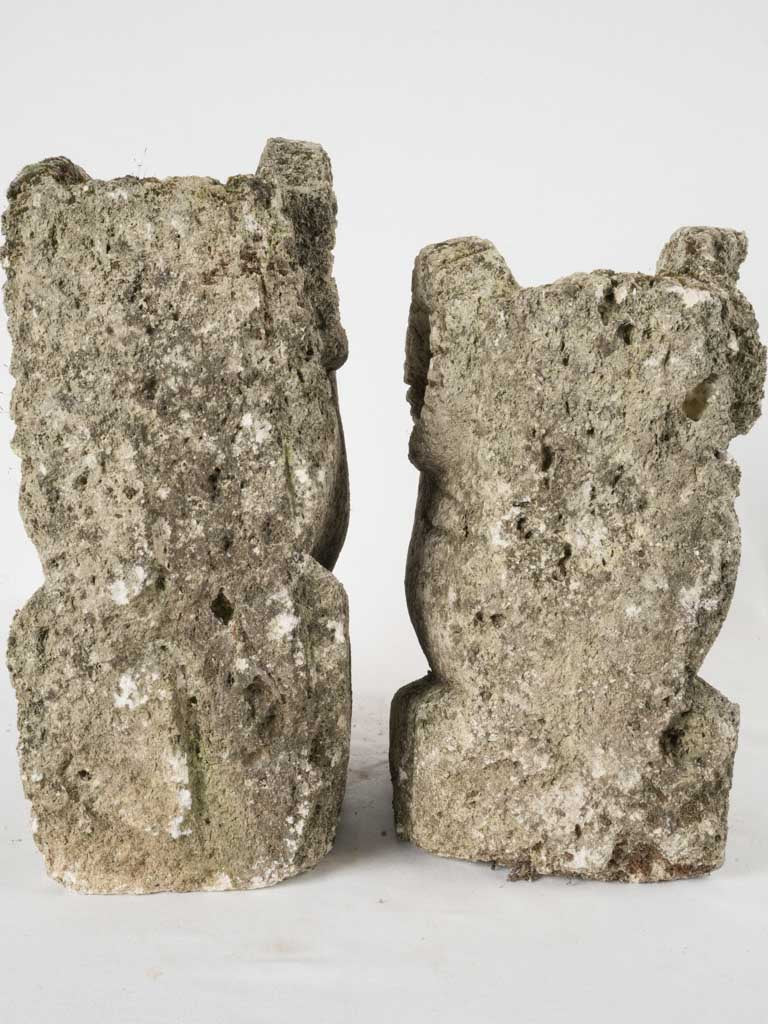 Pair of salvaged carved stone ram heads from a church 14¼"