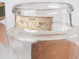 Elegant tin-lidded apothecary jars ensemble
