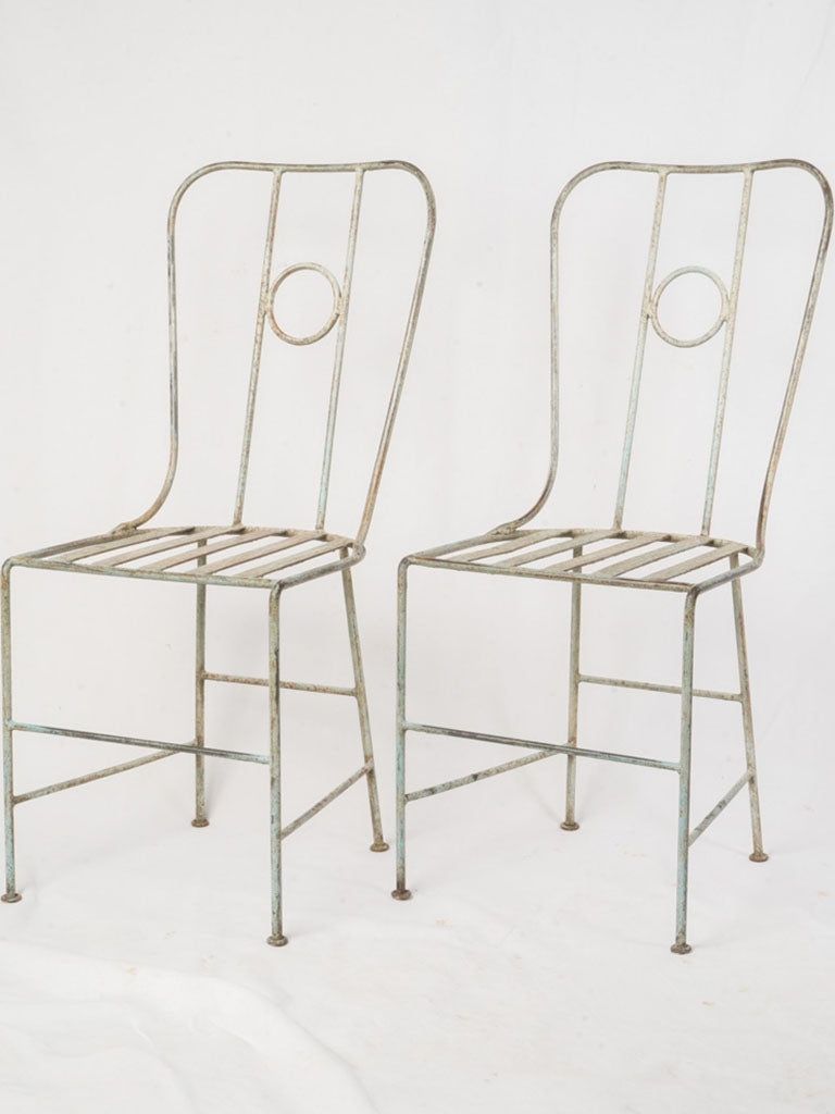 Pale blue patina iron chairs  