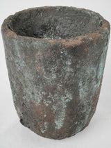 Aged European smelting crucible containers
