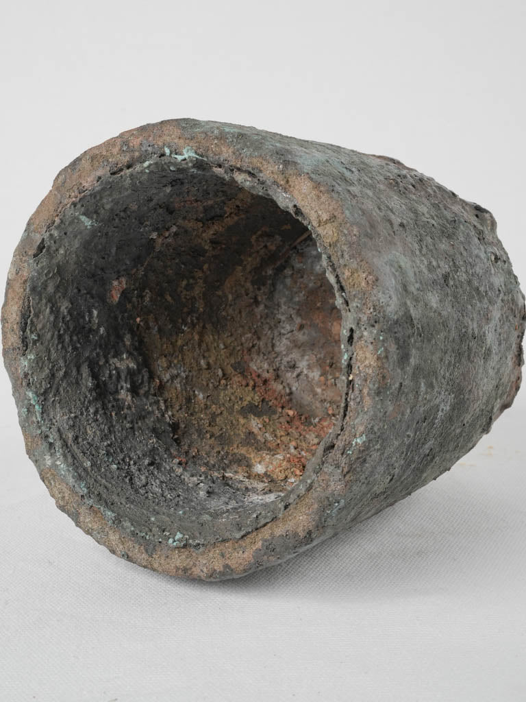 Textured 19th-century crucible foundry pots
