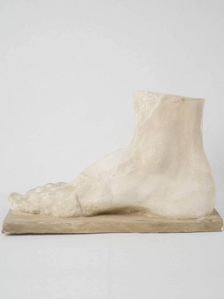 Aged, French sculptural plaster foot