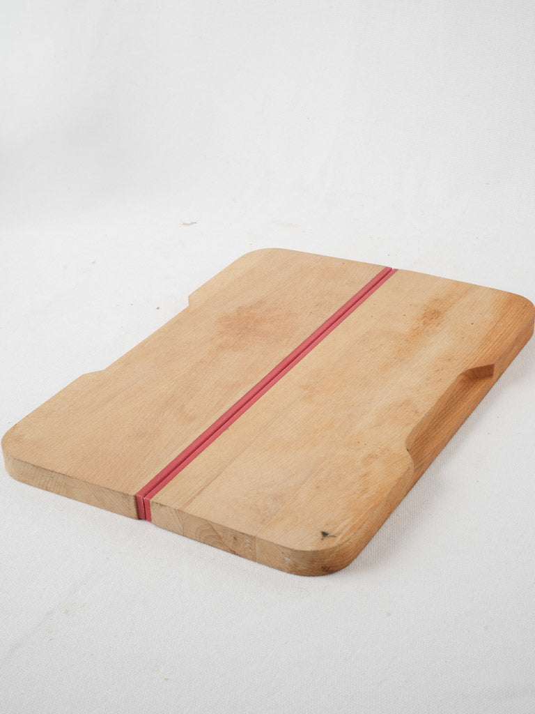 Worn Joseph Joseph baguette slicing board