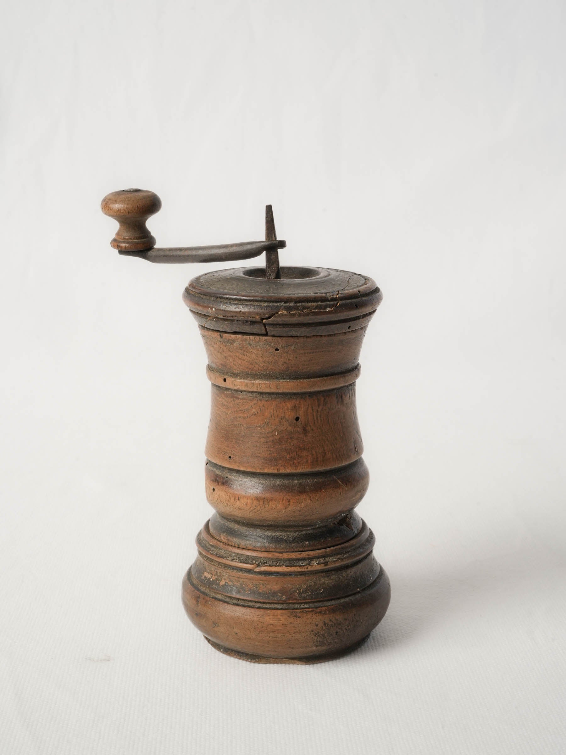 Antique fruitwood pepper grinder