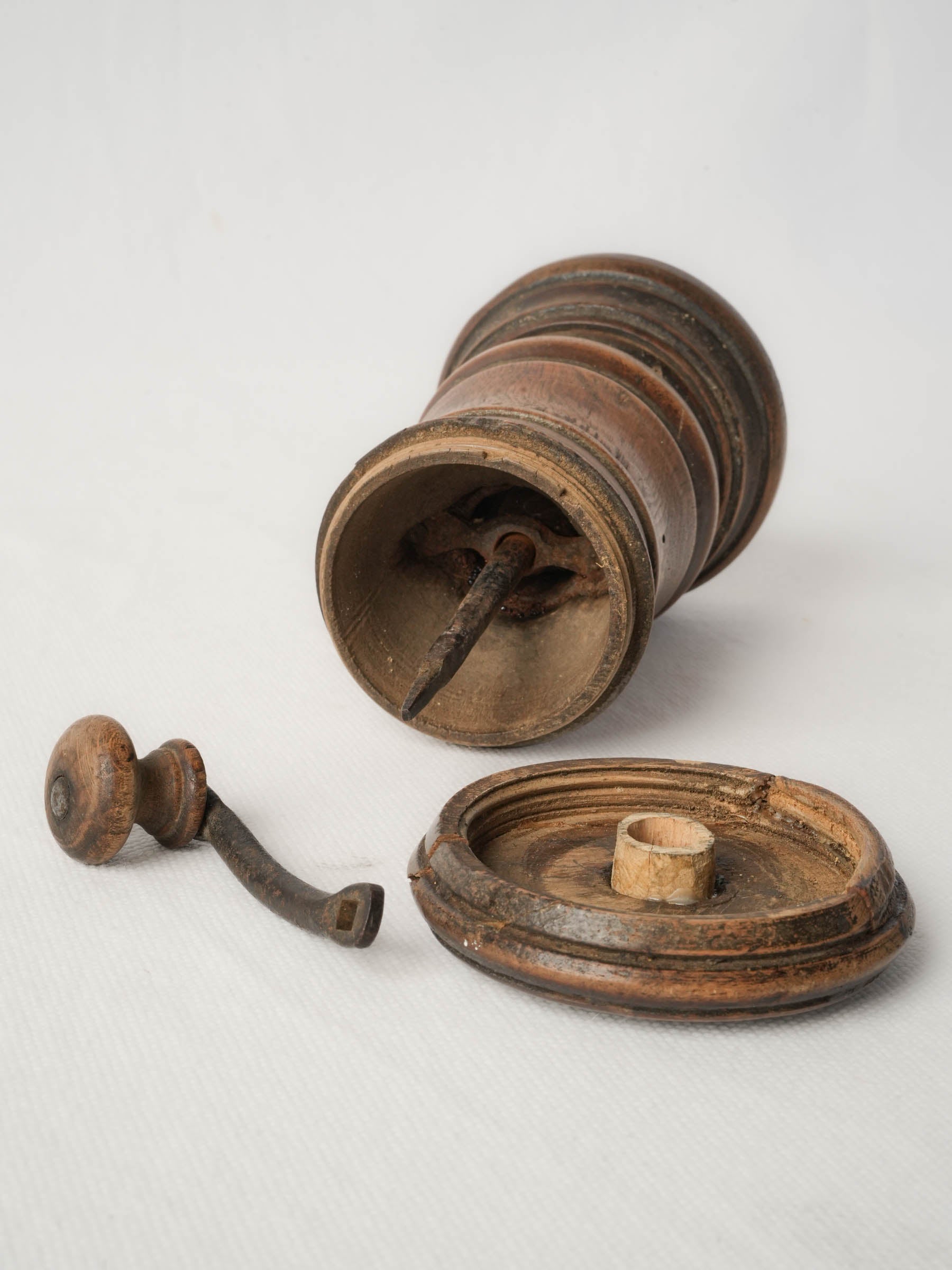 Sculptural iron-topped grinder