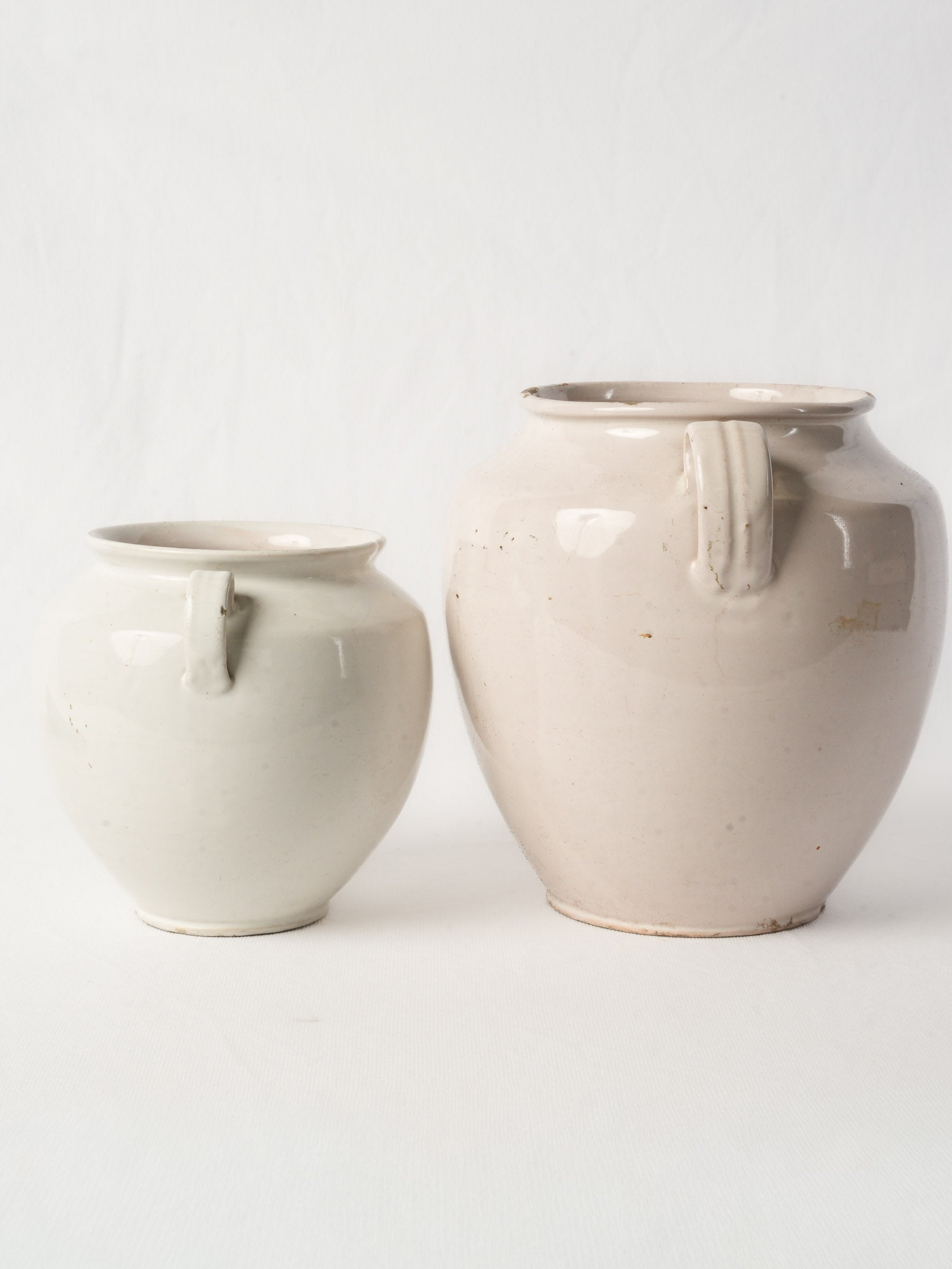 Softly rounded antique pottery set  
