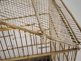 Weathered wooden birdcage hinge detail