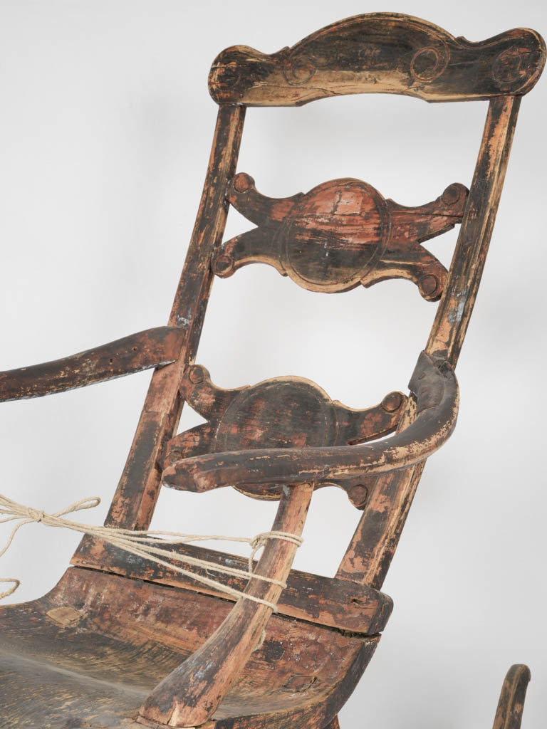 Charming rustic red rocking chair