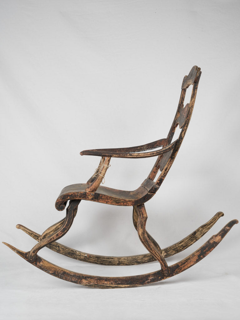 Weathered European wooden rocking chair