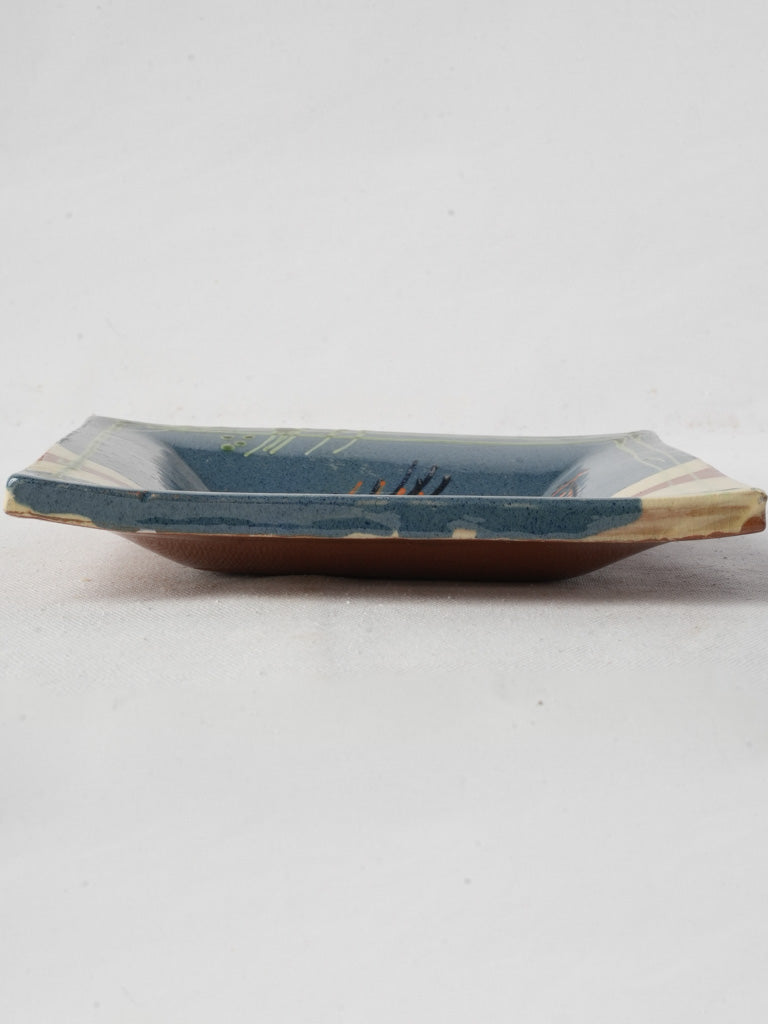 Whimsical glazed pottery piece  