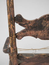 Aged European wooden rocking chair
