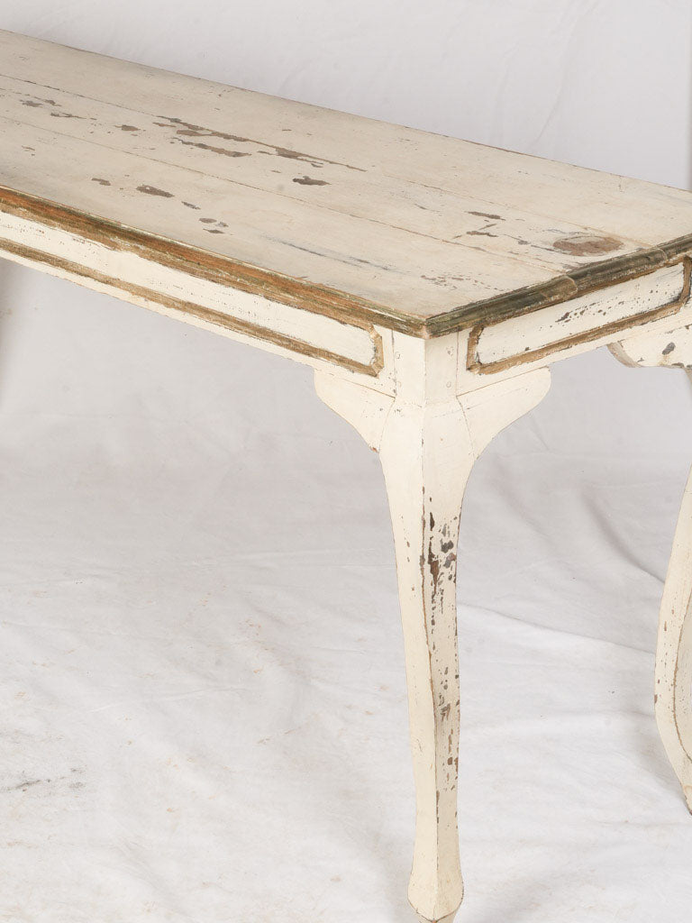 Distressed creamy-painted console