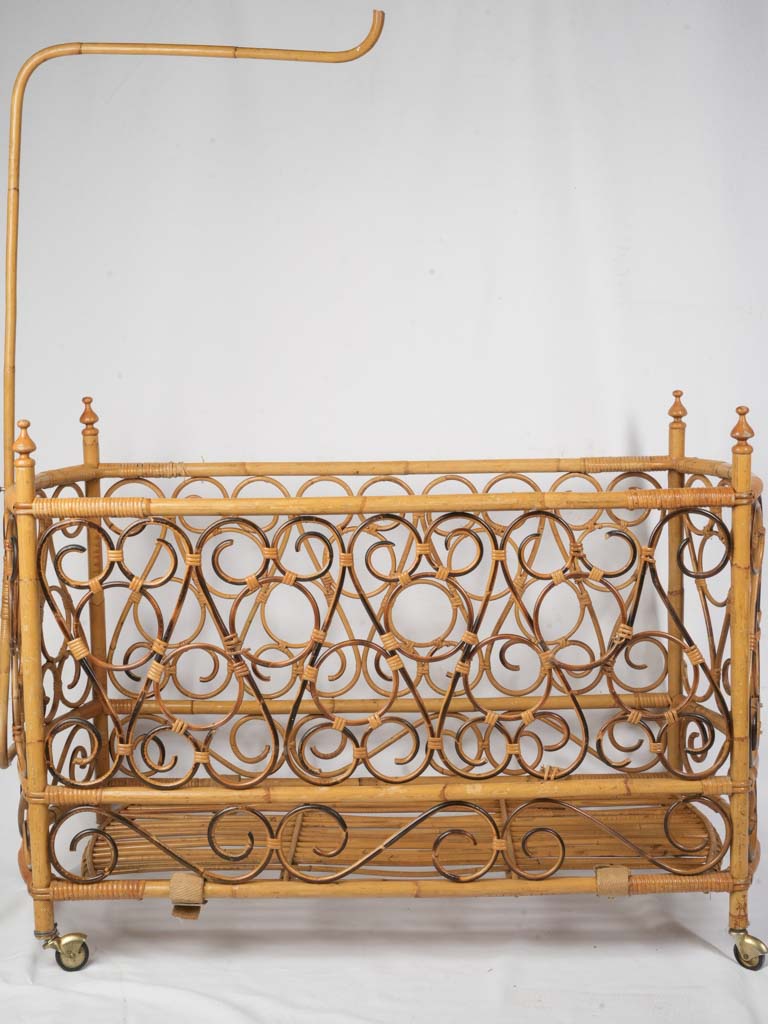 Honey-toned French rattan cradle  