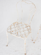 Pair of white lattice garden chairs
