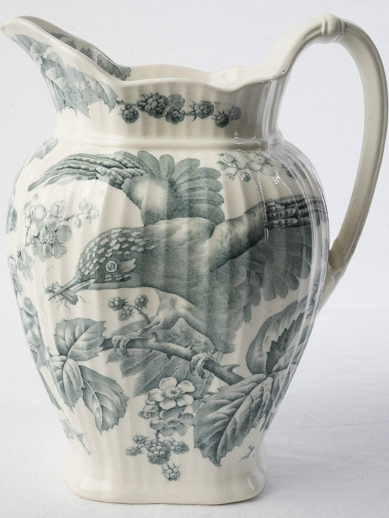 Scalloped rim ceramic water pitcher