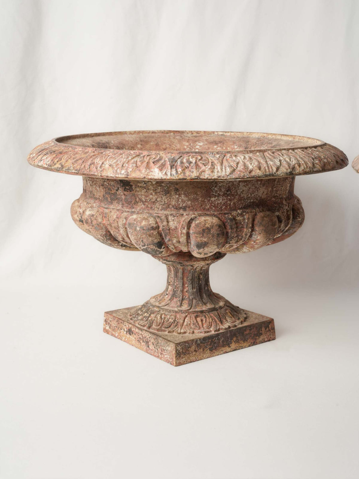 Weathered decorative outdoor urns