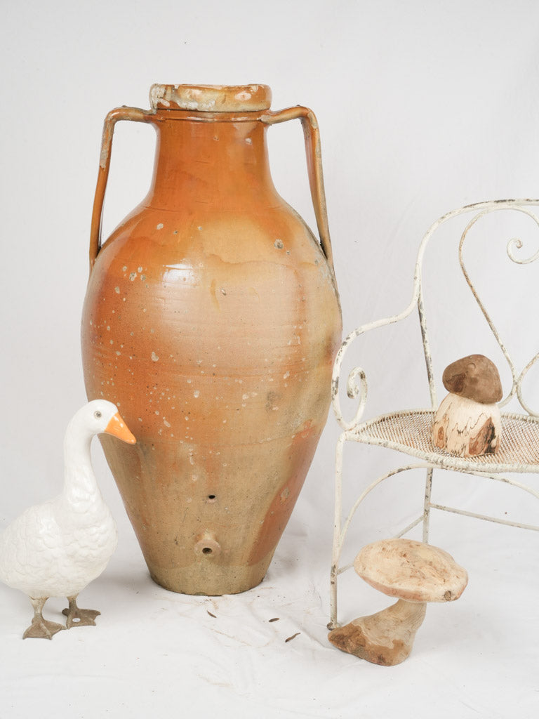 Ancient, handcrafted terracotta amphora jar