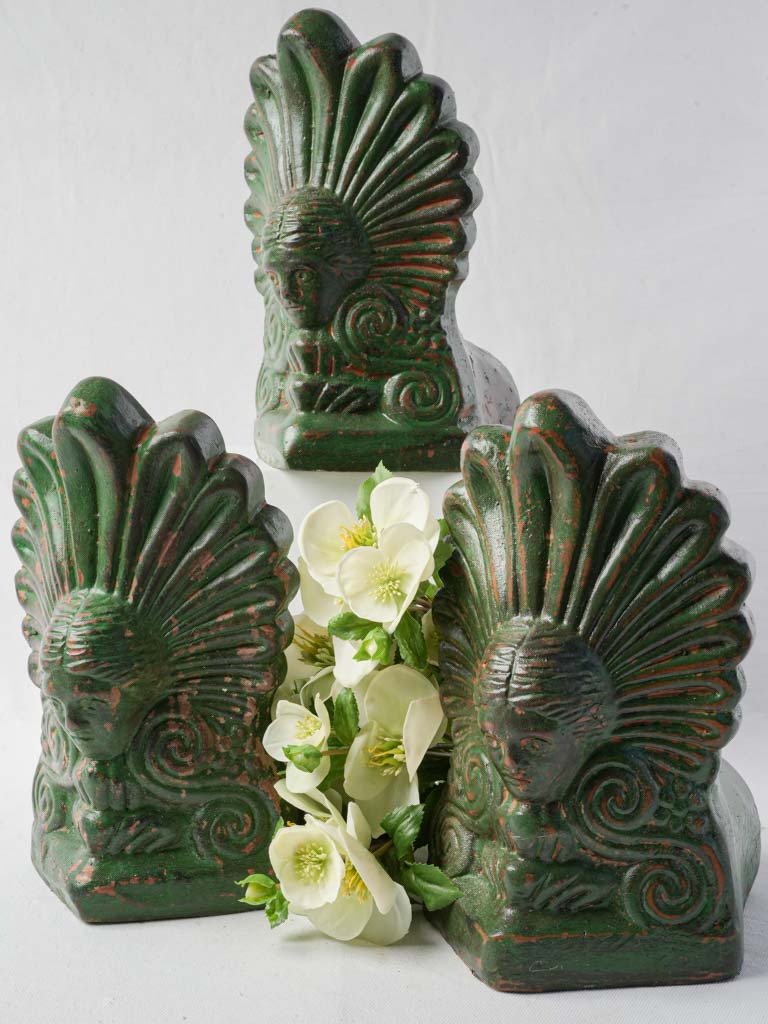 Striking green cast iron finials  