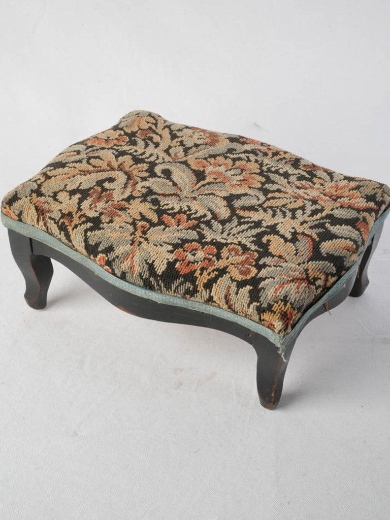 Elegant black-painted wooden stool