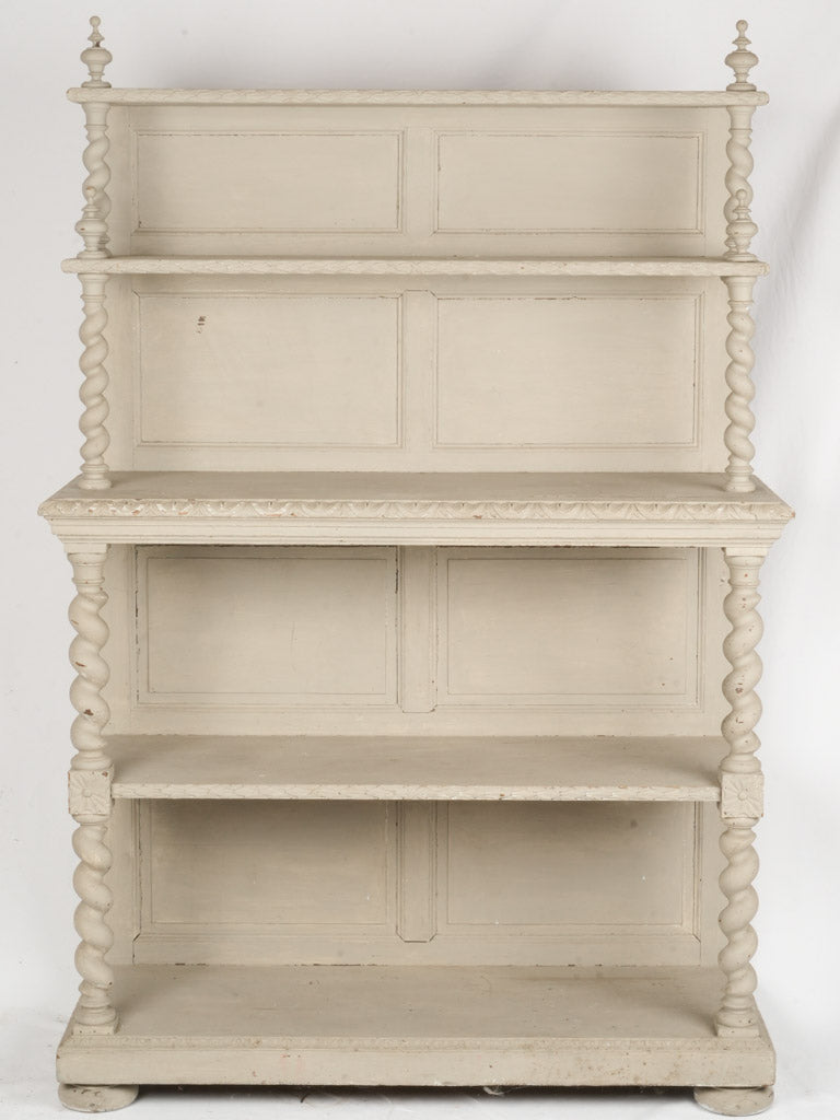 Intricately carved wooden étagère