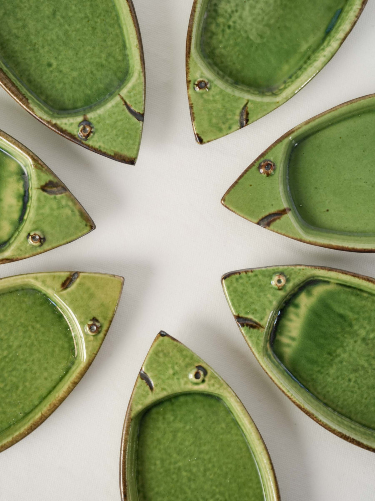 Handcrafted brown-detailed fish dishes