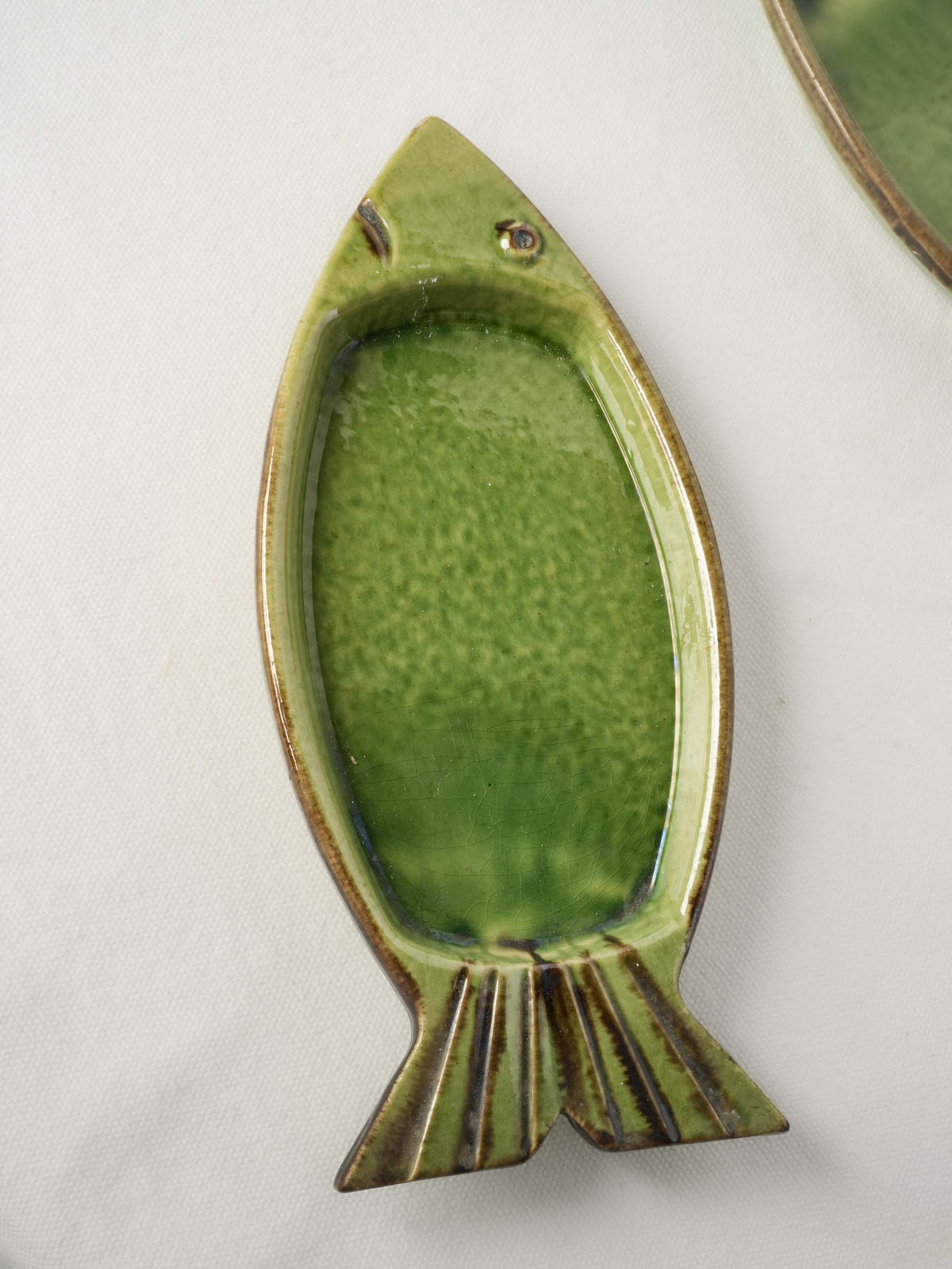 Expressive postwar French fish plates