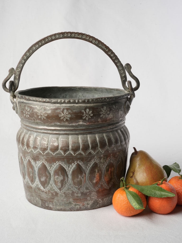 Antique hammered copper bucket