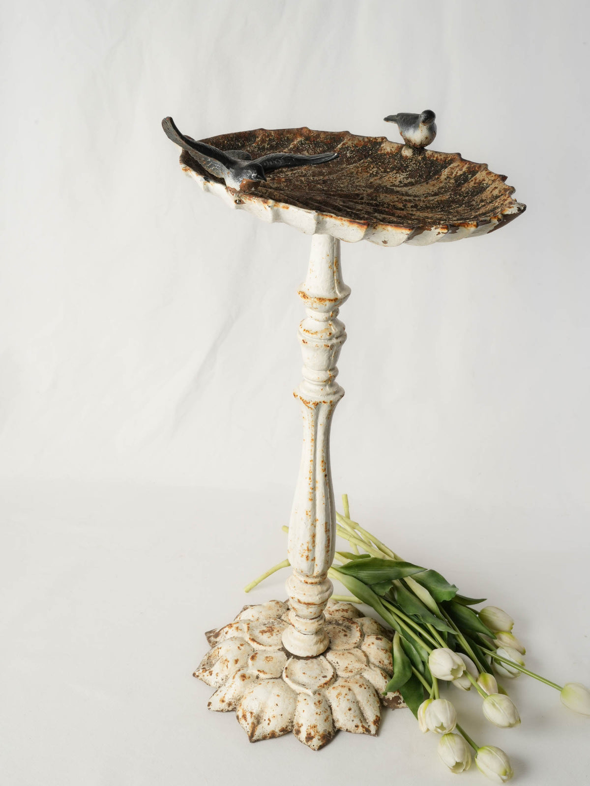 Charming rustic garden birdbath