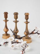 Handcrafted late-century wooden candlesticks