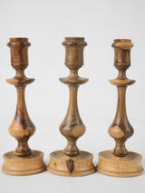 Antique-style olive wood candlesticks