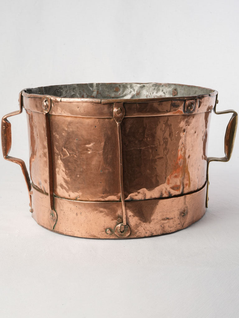 Hammered copper cookware piece  