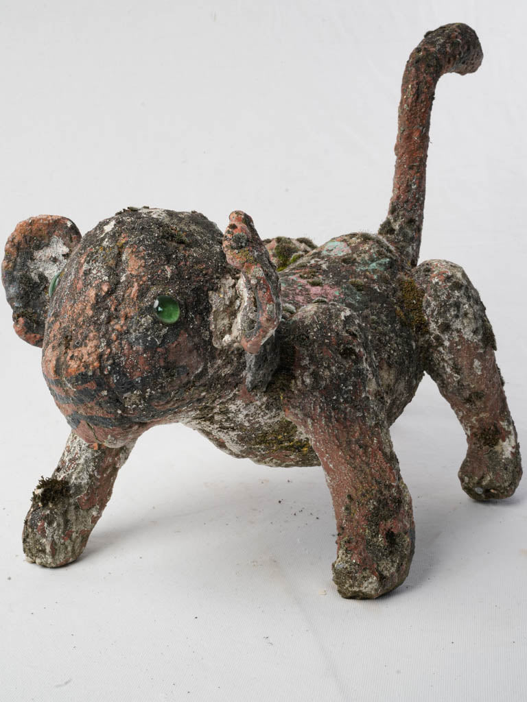 Enchanting concrete baby tiger sculpture  