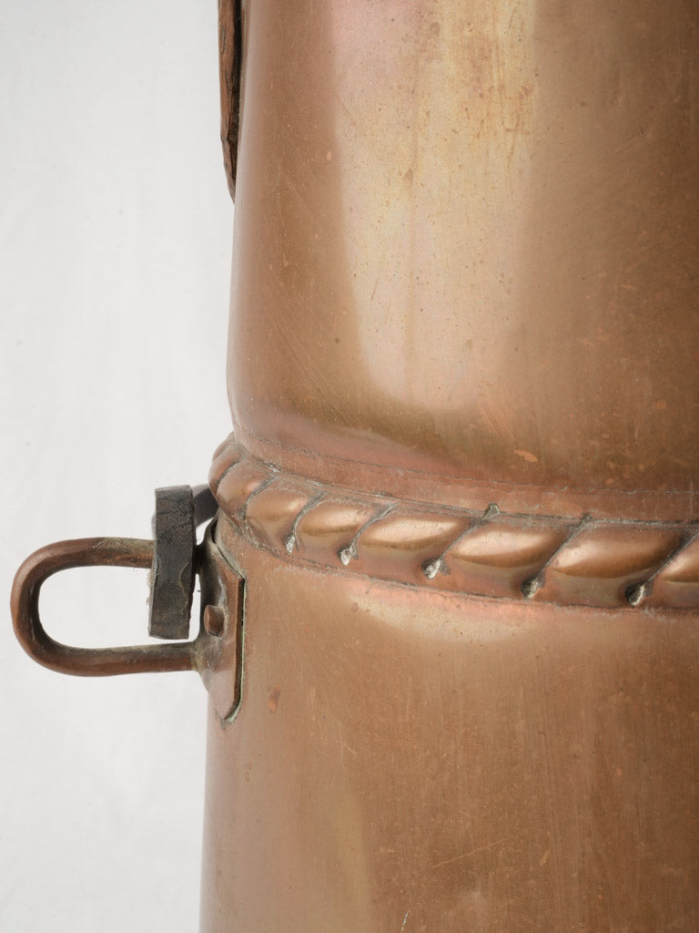 Rustic verdigris-adorned copper scuttle  