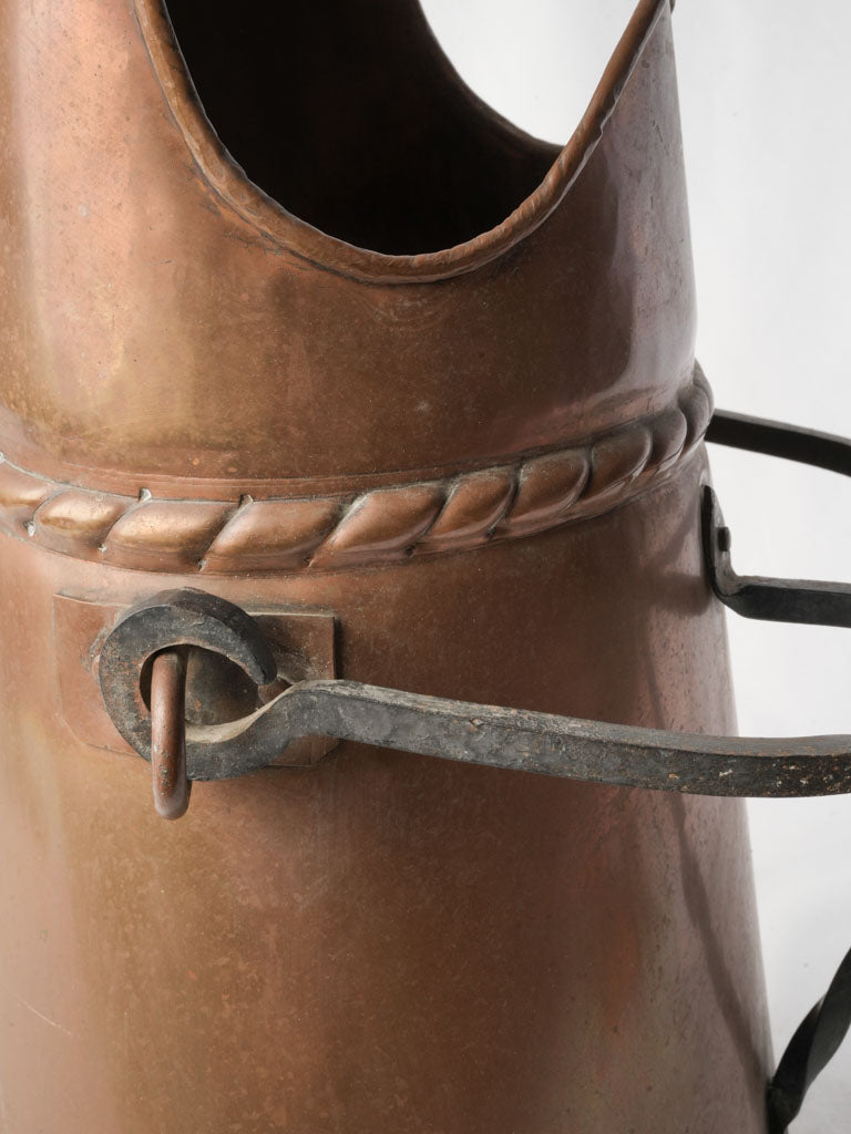 Traditional blacksmith-crafted coal scuttle  