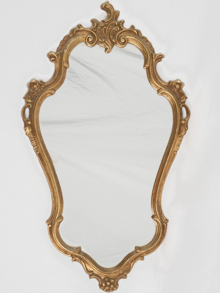 Antique Rococo gold-framed decorative mirror