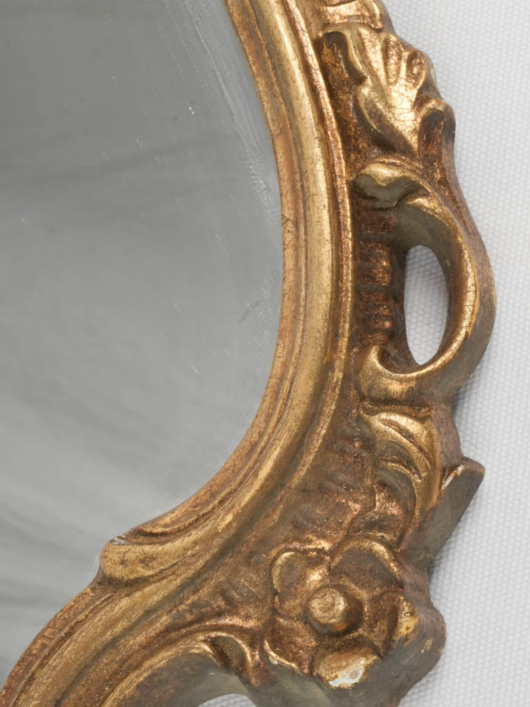 Sophisticated gold finish heirloom-quality mirror