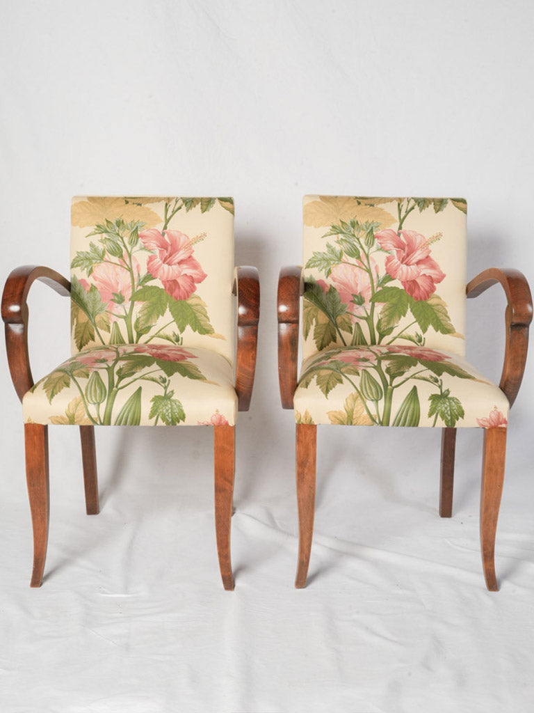 Sculptural scrolled-arm Art Deco chairs  