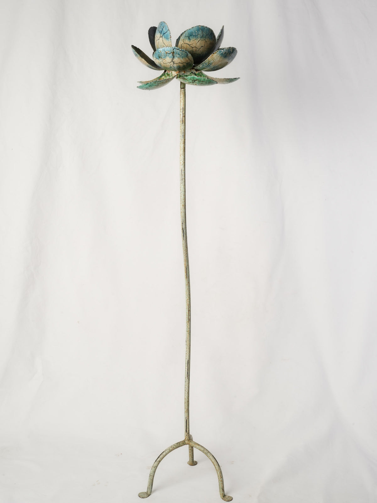 Playful retro blue metal sculpture  