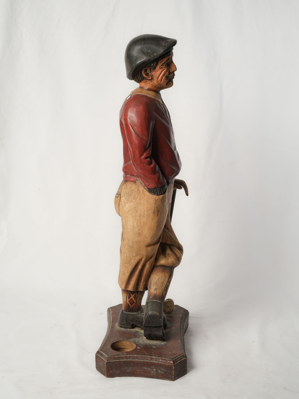 Antique painted-wood golf statue  